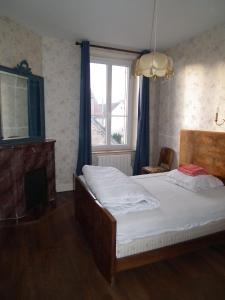 Postel nebo postele na pokoji v ubytování Gite de Chassigny + 37 fotografií