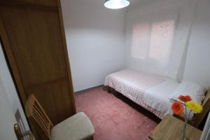 Posteľ alebo postele v izbe v ubytovaní Apartament Tarracoliva