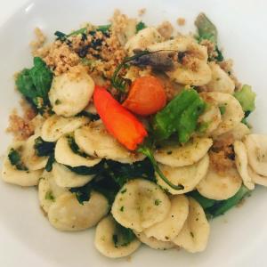a white plate of food with shrimp and vegetables at Masseria Valente in Ostuni