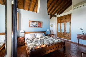 Cama o camas de una habitación en Hotel Fuente del Sol