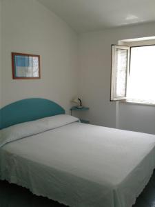 Ένα ή περισσότερα κρεβάτια σε δωμάτιο στο Borgo Antico +39 φωτογραφίες