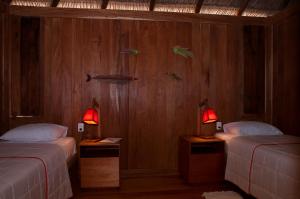 Cama ou camas em um quarto em Jaguaribe Lodge e Kite