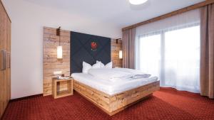 Posteľ alebo postele v izbe v ubytovaní Panorama Appartements