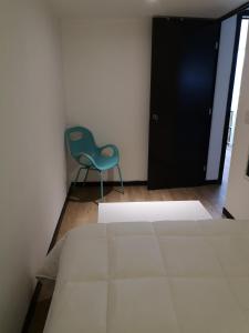 Letto o letti in una camera di Hostal Top Location ideal para viajeros Polanco