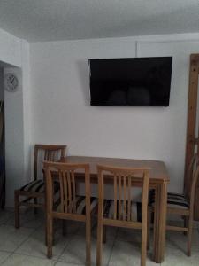 A television and/or entertainment centre at Art apartment Syngrou