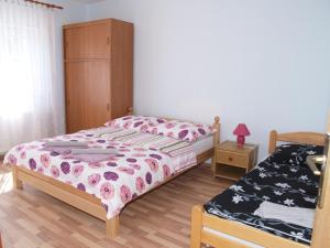 Postel nebo postele na pokoji v ubytování Rooms Žigić