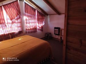 Postel nebo postele na pokoji v ubytování Las Herraduras