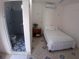 Postel nebo postele na pokoji v ubytování Habitaciones Chiquil Ha