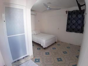 Postel nebo postele na pokoji v ubytování Habitaciones Chiquil Ha