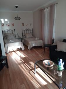 Posteľ alebo postele v izbe v ubytovaní La Casa de Pepa