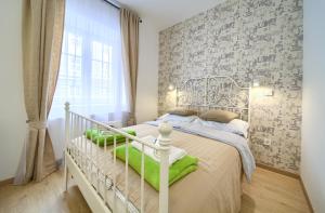 Posteľ alebo postele v izbe v ubytovaní Logo apartments 5 min walk to main square
