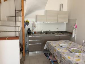 Cucina o angolo cottura di Residence Puntamanca