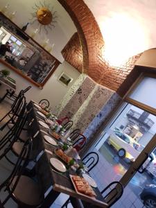 Restoranas ar kita vieta pavalgyti apgyvendinimo įstaigoje Cavallo Bianco