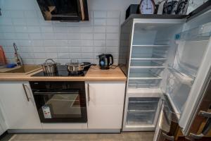 Kuchyňa alebo kuchynka v ubytovaní 24/7 Studio Bialystok