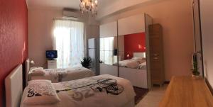 Postel nebo postele na pokoji v ubytování Appartamento Ceci in Trastevere