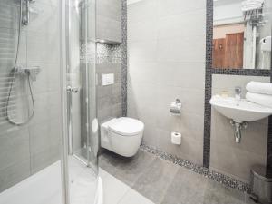 Kúpeľňa v ubytovaní Hotel Miodowa