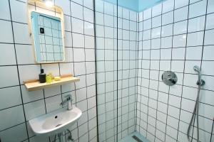 Kúpeľňa v ubytovaní Gellerico Apartments Deák Square