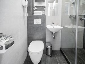 Kúpeľňa v ubytovaní Hotel Miodowa