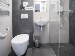 Kúpeľňa v ubytovaní Hotel Miodowa