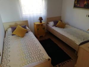 Postel nebo postele na pokoji v ubytování Bellavista Medulin Sea View