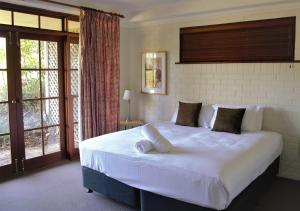 Llit o llits en una habitació de Woolshed Hill Estate