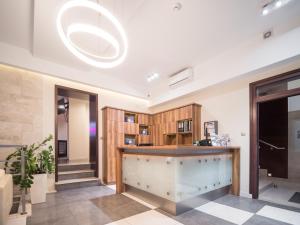 Kuchyňa alebo kuchynka v ubytovaní Hotel Miodowa