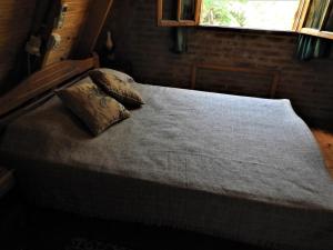 Ένα ή περισσότερα κρεβάτια σε δωμάτιο στο Cabaña La Felipa