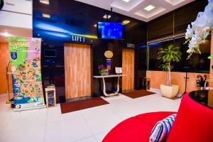 TV a/nebo společenská místnost v ubytování Ritz Garden Hotel Manjung