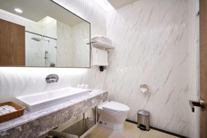 Un baño de So Fun Hotel