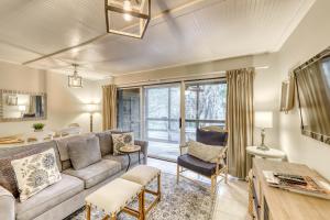 a living room with a couch and a table at Mariner's Watch 4250 in Kiawah Island
