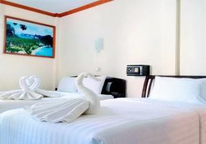Tempat tidur dalam kamar di Golden Bee PhiPhi