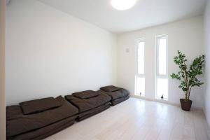 Posezení v ubytování Irie House Motobu