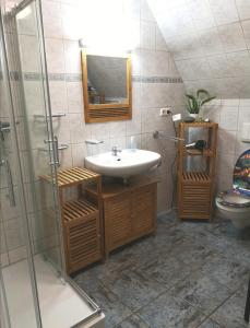Ένα μπάνιο στο Ferienwohnung Haus Sommerwind