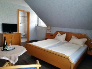 Katil atau katil-katil dalam bilik di Gästehaus Wörner