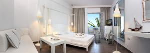 Posteľ alebo postele v izbe v ubytovaní White Suites Resort