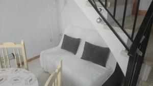 Łóżko lub łóżka w pokoju w obiekcie Maribella chambres à louer