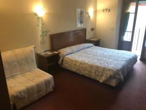 Postel nebo postele na pokoji v ubytování B&B Franceschi