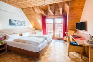 Postel nebo postele na pokoji v ubytování Hotel-Restaurant Zur Kanne