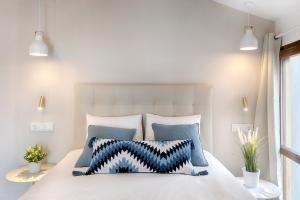 Ein Bett oder Betten in einem Zimmer der Unterkunft Hostal Altea House