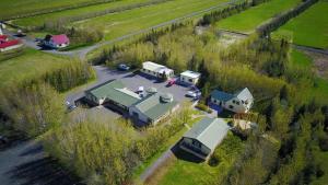 an aerial view of a house with a trailer at Hotel Hjardarbol in Selfoss