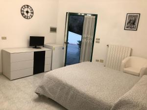 Krevet ili kreveti u jedinici u okviru objekta Hotel Falco D'oro