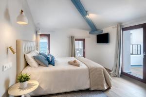 Ein Bett oder Betten in einem Zimmer der Unterkunft Hostal Altea House