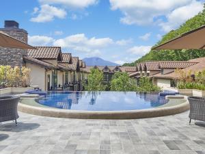 an image of a swimming pool at a house at Le Grand Karuizawa Hotel and Resort in Karuizawa