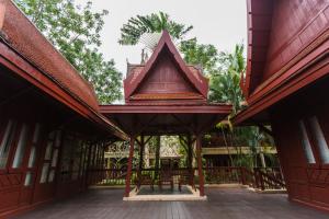 a pavilion with a roof on a building at Ma Doo Bua Phuket - SHA Extra Plus in Thalang