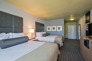 Кровать или кровати в номере Holiday Inn Express & Suites Carlisle, an IHG Hotel