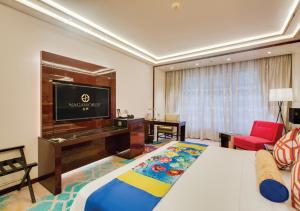 TV a/nebo společenská místnost v ubytování NagaWorld Hotel & Entertainment Complex