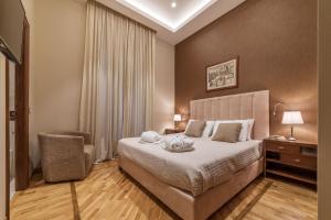 A bed or beds in a room at 900 Apartments Lazio, Emilia & La Corte