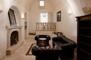 Posezení v ubytování Alla dimora di Chiara Suite and Rooms