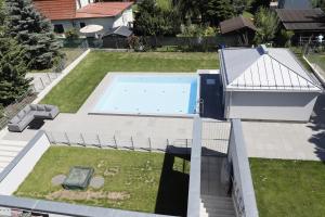 The swimming pool at or close to Rooftop Terrace, free garage parking and Pool!