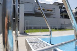 The swimming pool at or close to Rooftop Terrace, free garage parking and Pool!